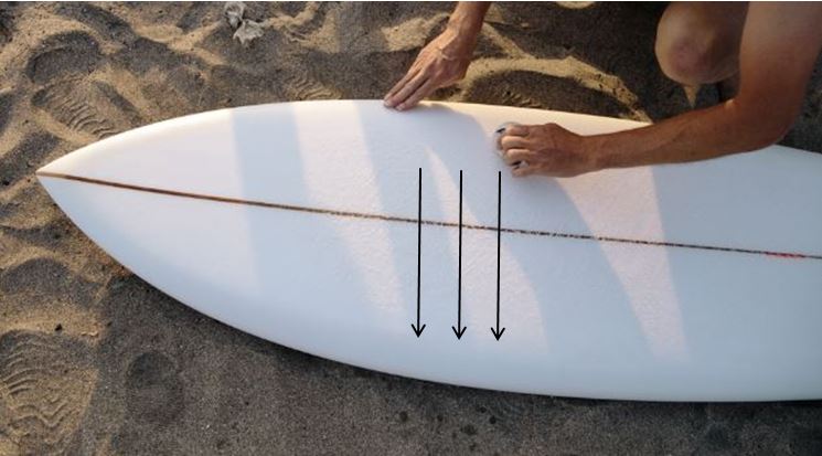 how to remove wax from a surfboard